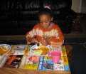 My sister and I eating at the table